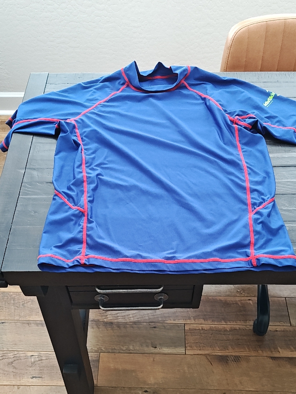 Woman's Blue Rash Guard Swim Shirt with Red Accents